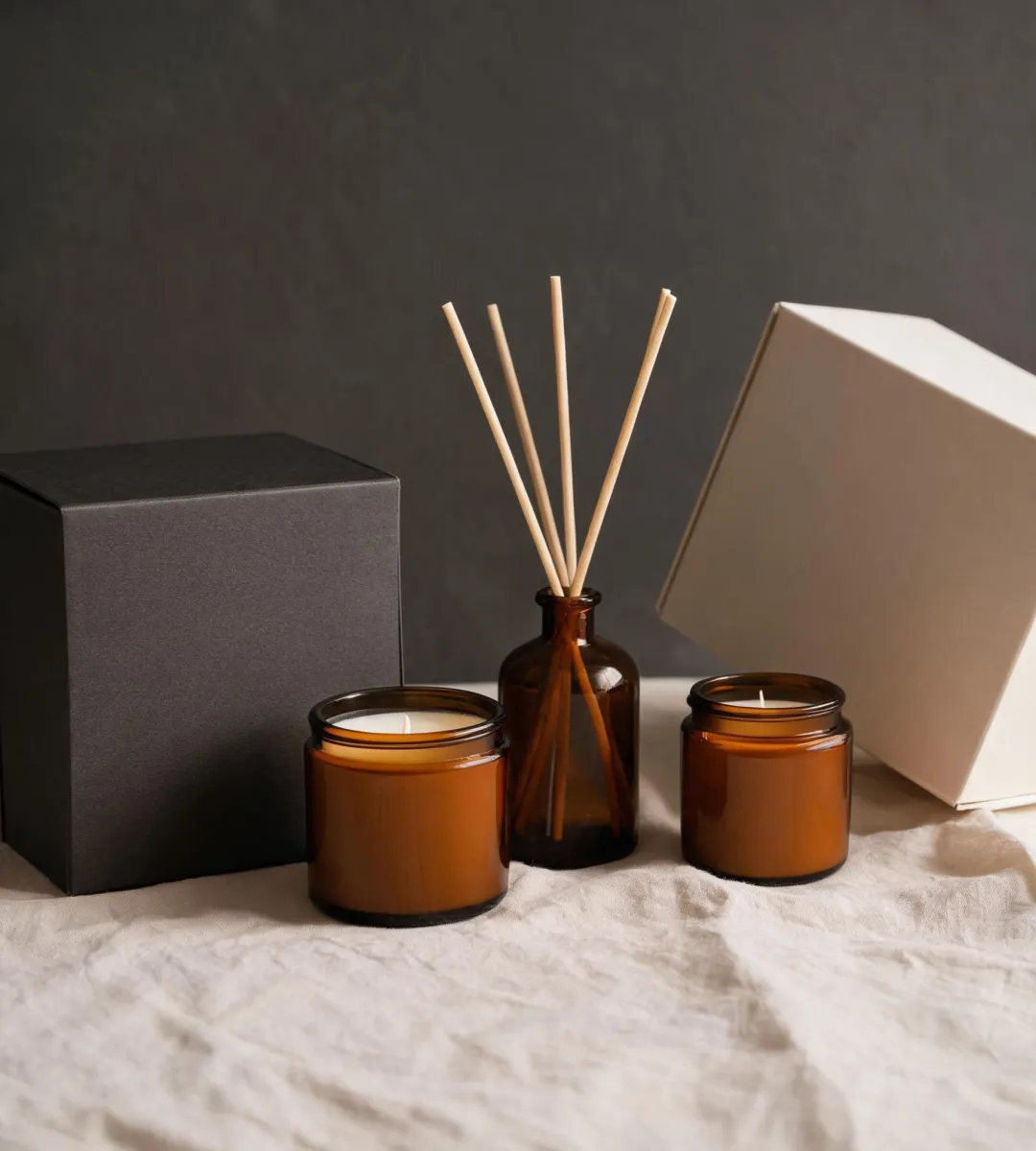 Mariposa candles and reed diffusers in a quiet home fragrance still life